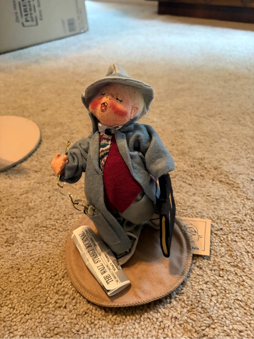 Annalee gray coat doll with red vest and cream face